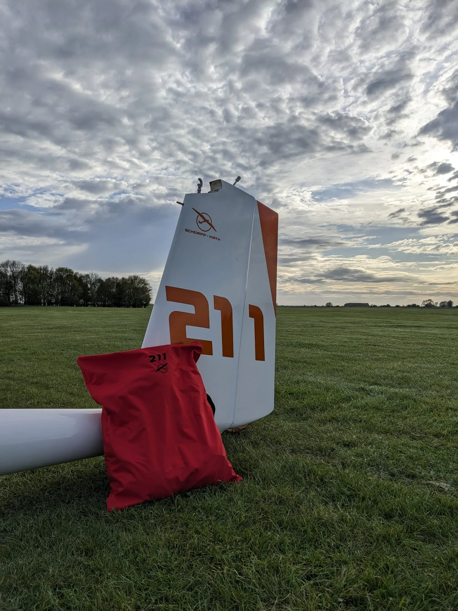 Red Parachute Bag (against a Glider)